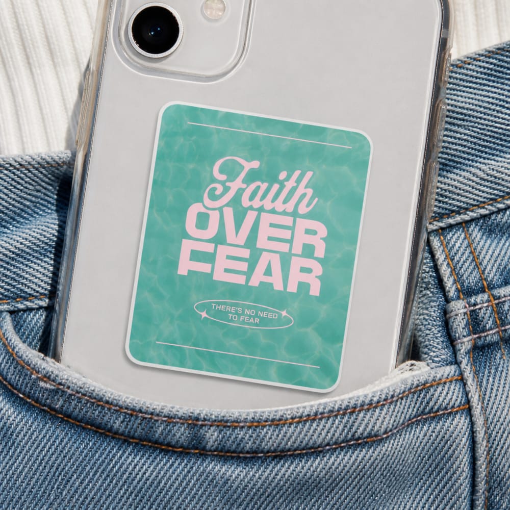Sticker mockup on a phone case in a denim pocket