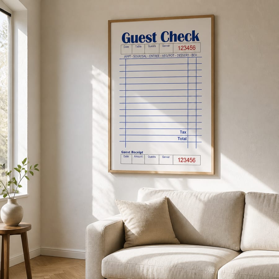 New AI poster mockup: Guest Check print hung above a sofa with window-light shadows falling across the wall and print